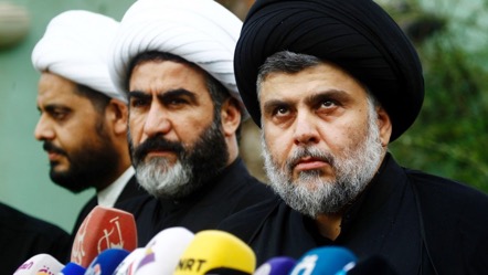 Shiite cleric Muqtada al-Sadr (R), a controversial but influential figure in Iraqi politics, convened a meeting Tuesday with other Shiite leaders aimed at increasing their cooperation. (Haidar Hamdani/AFP/Getty Images)