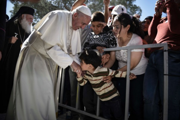 Pope Francis takes refugees back to Rome following provocative and emotional Lesbos visit